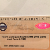 Henrik Lundqvist autographed Game Used puck Steiner14/30