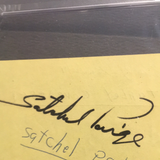 Satchel Paige autographed yellow album page PSA/DNA encapsulated