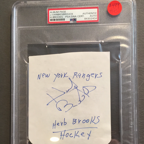 Herb Brooks autographed album page PSA/DNA encapsulated